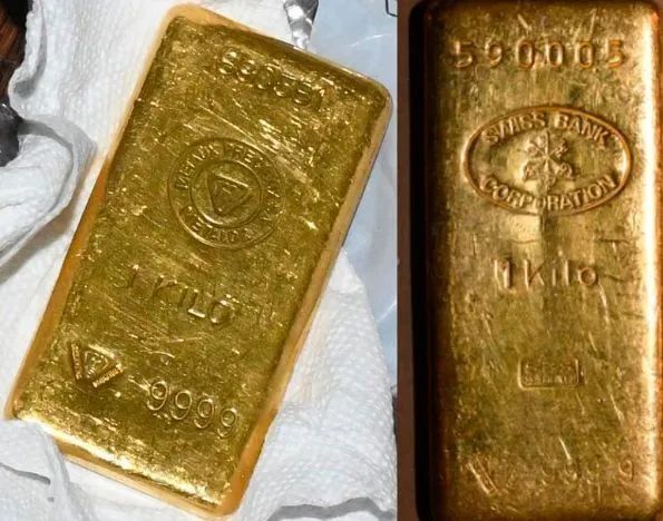 藏在衣服、衣柜和保险箱中的财物，包括约50万美元现金和价值15万美元的金条 ... ...