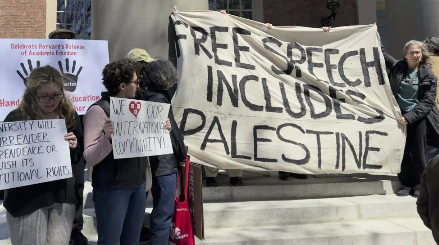 Students, faculty and members of the Harvard University community rally Students, faculty and members of the Harvard University community rally
